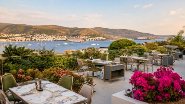 Bodrum Dining & Event Guide featuring luxury restaurants, Bodrum Castle views, sunset dining, live music venues, romantic terraces, Turkish meze culture, and exclusive event locations in Bodrum.